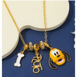 Gold PLUTO Necklace 21.65" L Three Charms & Clear Spacers